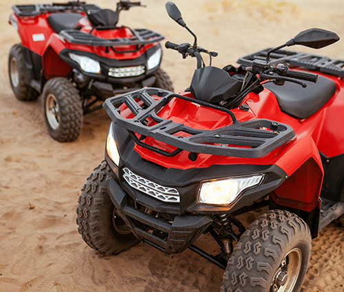 Two Red ATVs