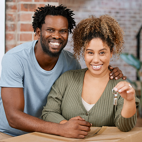 Happy-Couple-with-Keys