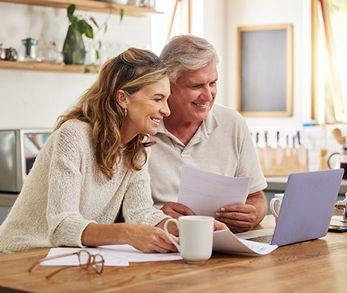 Couple Looking at a Computer